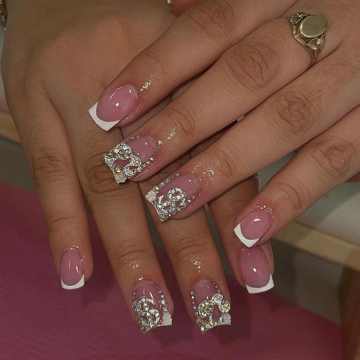 Premium artificial nails with sparkling 3D applications Stornfield
