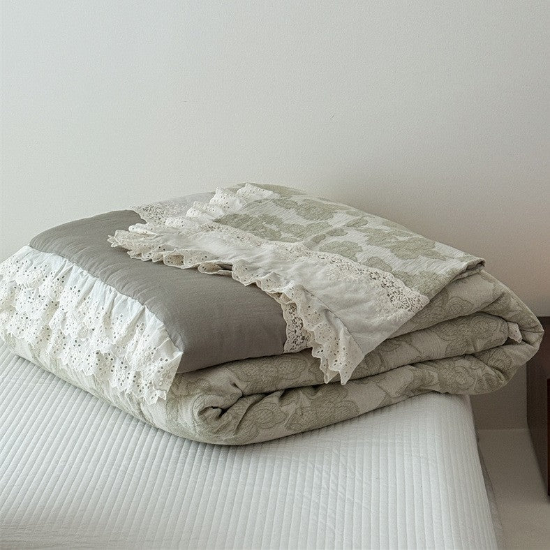 Vintage cotton bedding set with lace trim and hand-drawn floral pattern