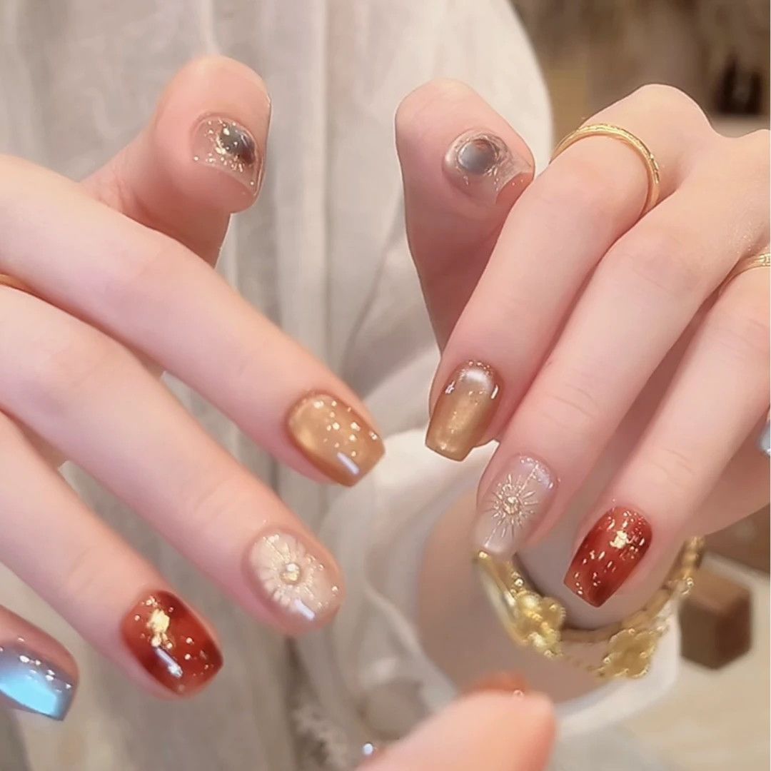 Artistic Nail Art Extensions with Floral Accents Stornfield
