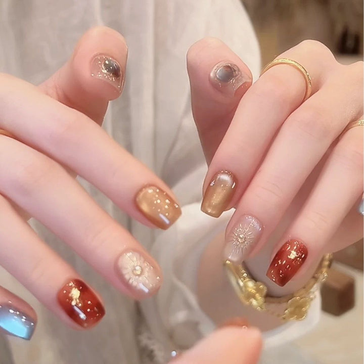 Artistic Nail Art Extensions with Floral Accents Stornfield