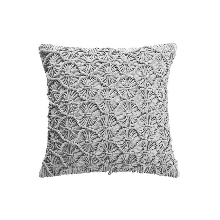Rectangular cushion cover in macramé style with tufted floral appliqués and fringes