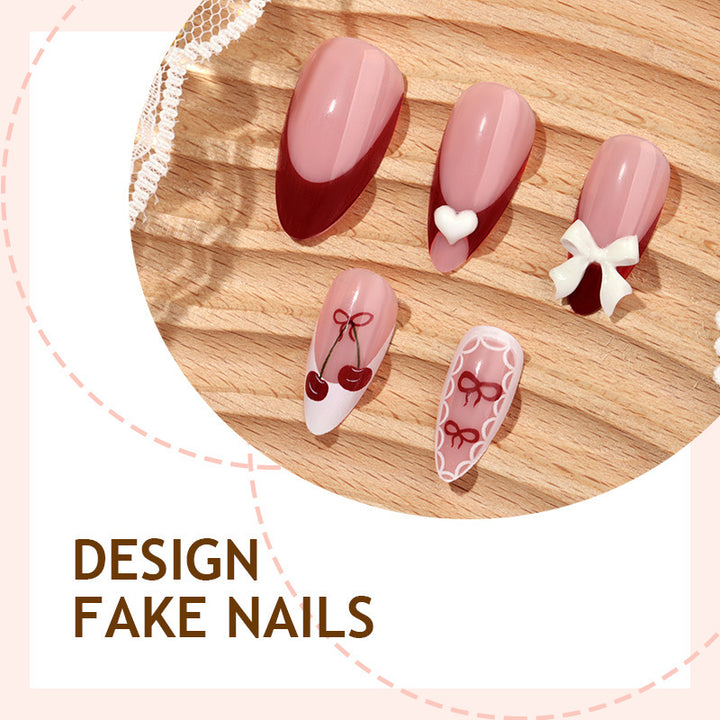 Fake nail set with playful motifs and elegant accents Stornfield