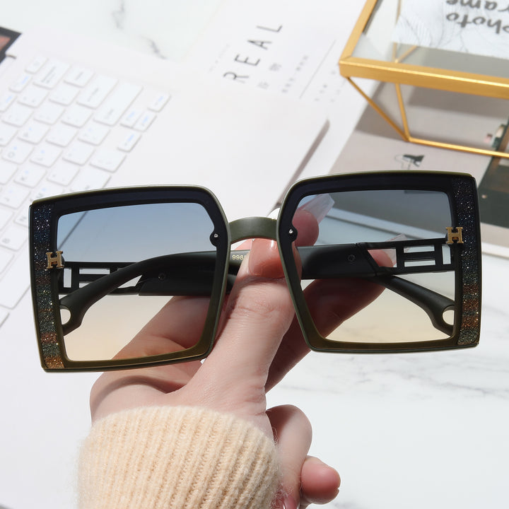Women’s fashionable sunglasses with extravagant, rectangular frame Stornfield