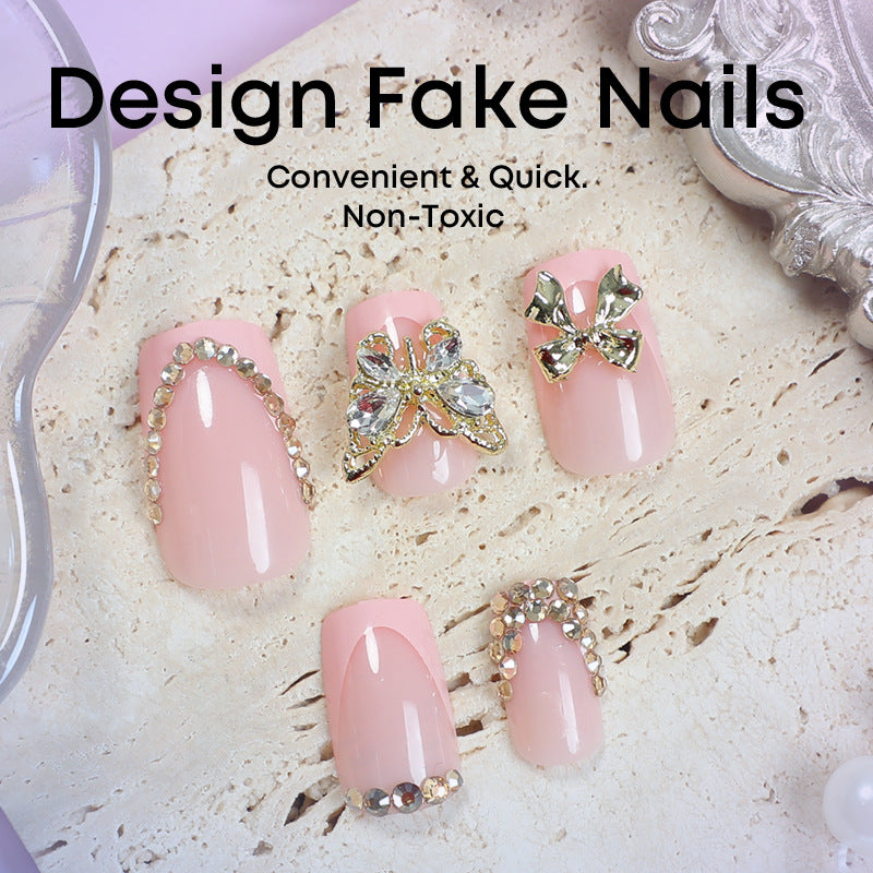 Glamorous artificial nail set with floral accents and glitter decorations Stornfield