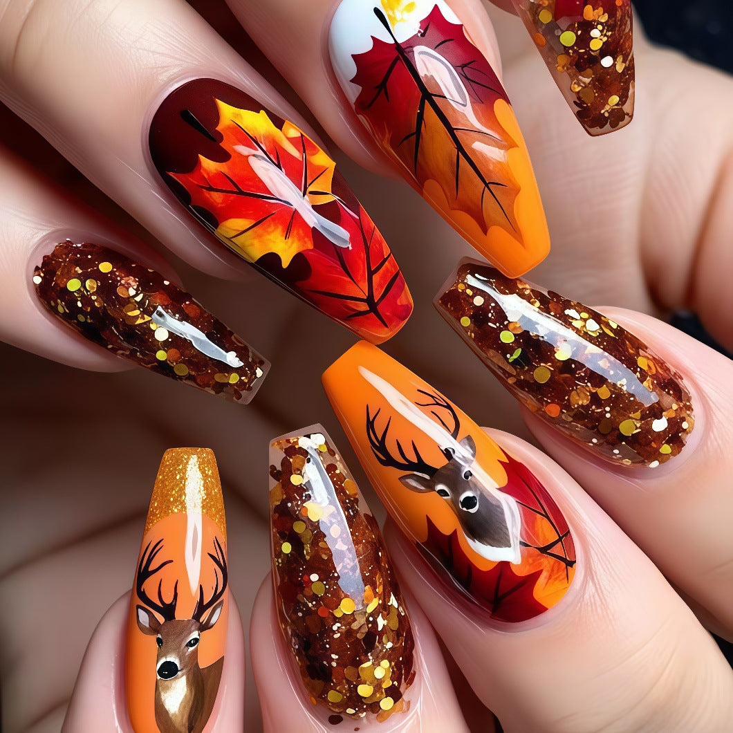 Artificial nails in autumn leaf design Stornfield