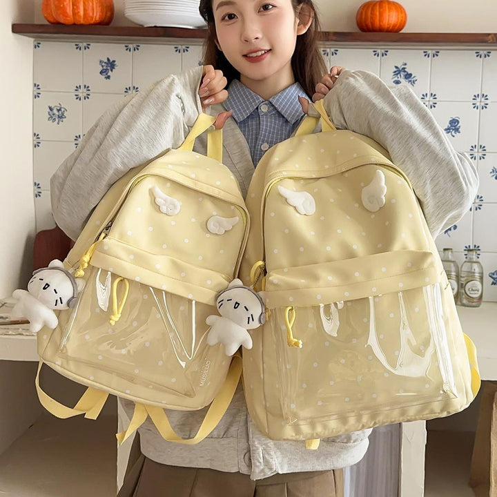 Polka Dot Patterned Backpack with Playful Wing Accents Stornfield