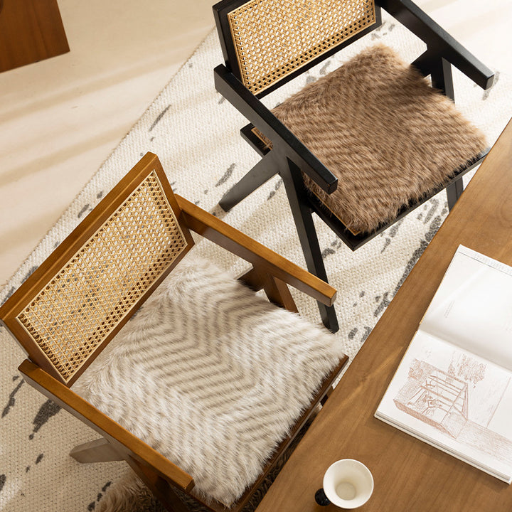 Square chair cushion made of cozy artificial fur with non-slip base and strap attachment Stornfield