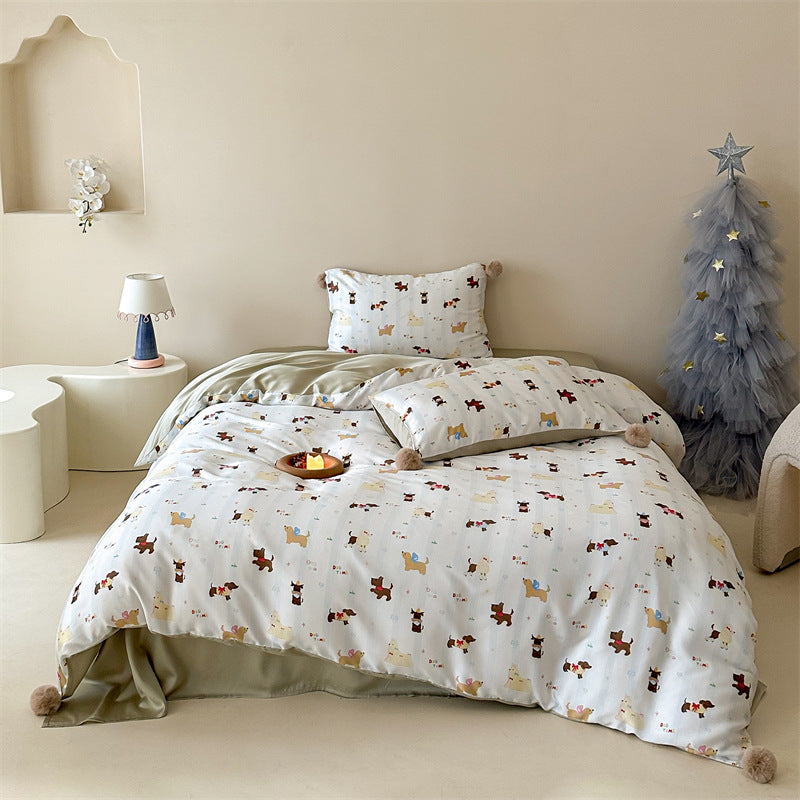 Children's bedding set with pompom corners and playful animal and heart print