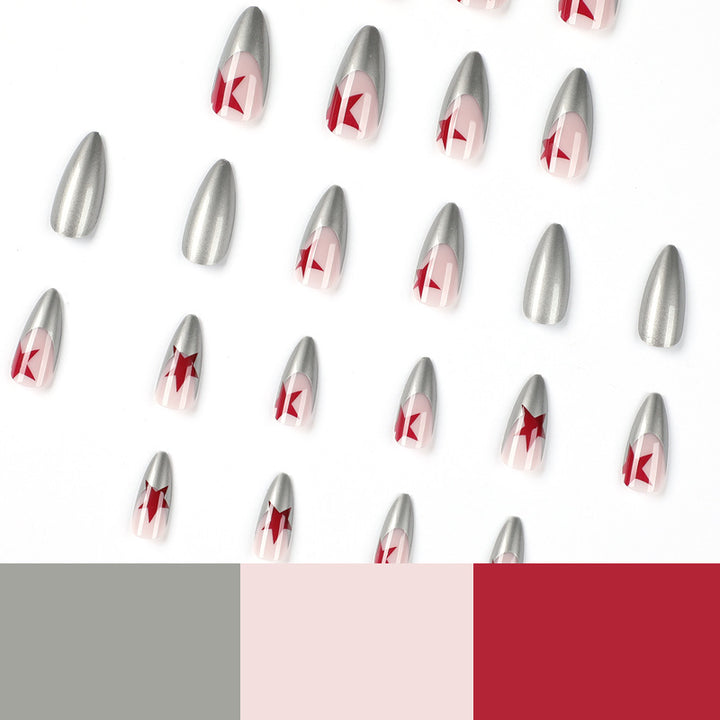 Artful stiletto nails with silver and star motifs Stornfield