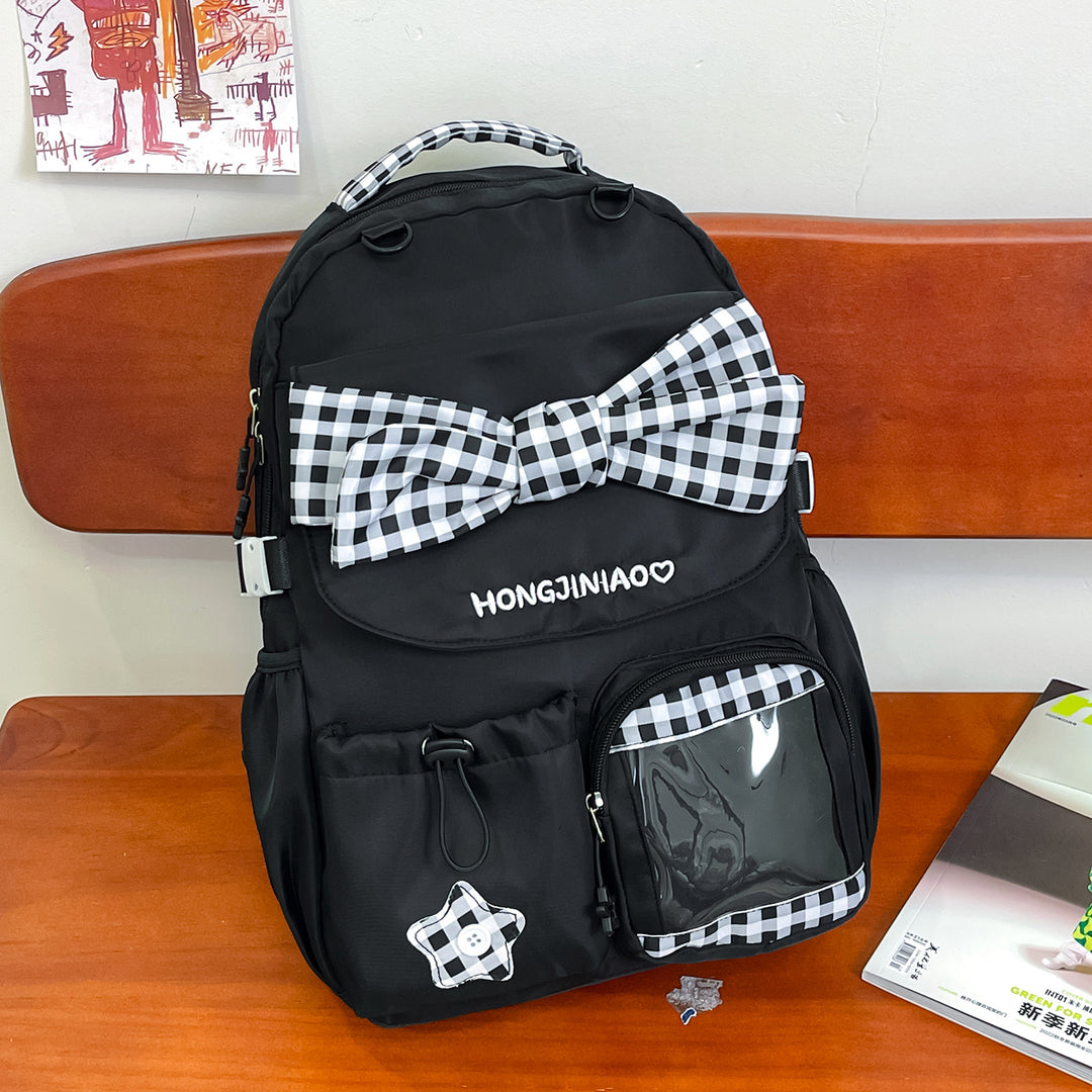 Playful Bow-Embellished Backpack Stornfield