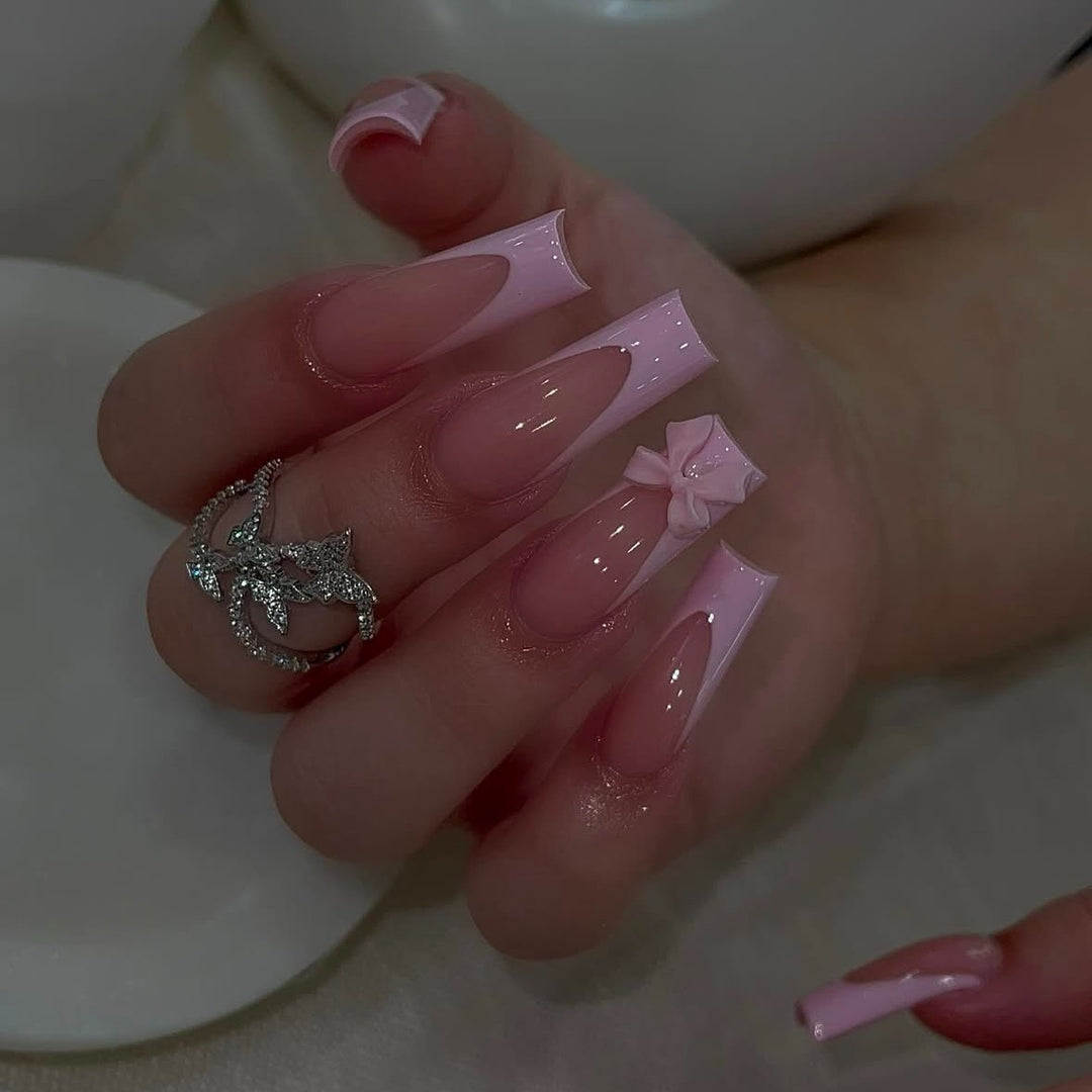 Artificial nail set with elegant tips and playful 3D design Stornfield
