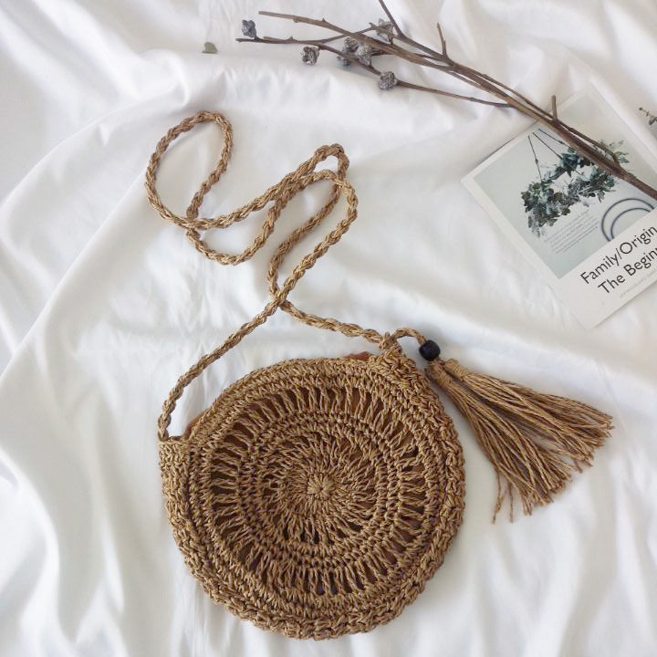 Hand-knotted round shoulder bag made of natural materials Stornfield