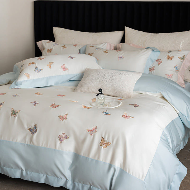 Luxurious cotton satin bedding set with embroidered butterfly appliqués