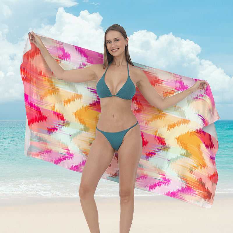 Beach towel with vibrant tropical plant motif Stornfield