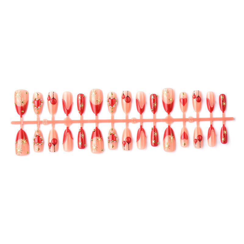 Elegant artificial nails with romantic gold and pearl embellishments Stornfield