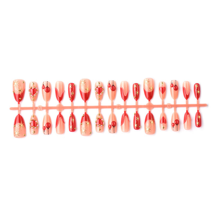 Elegant artificial nails with romantic gold and pearl embellishments Stornfield