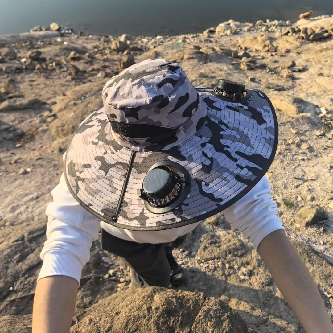 Ventilated sun hat with integrated solar fans and wide brim Stornfield