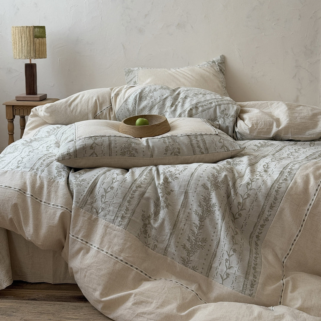 Natural linen-cotton bedding set with embroidered border and vintage pattern
