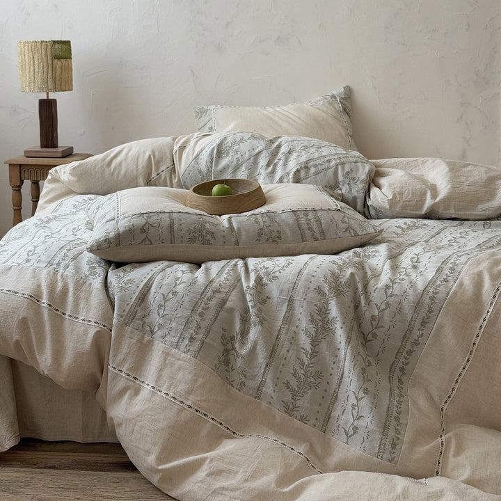 Natural linen-cotton bedding set with embroidered border and vintage pattern