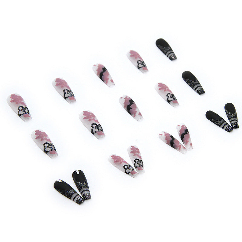 Artificial nail set with creative 3D elements and sparkling accents Stornfield