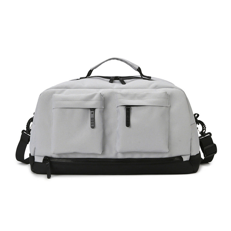 Sporty travel bag with two additional outer pockets Stornfield