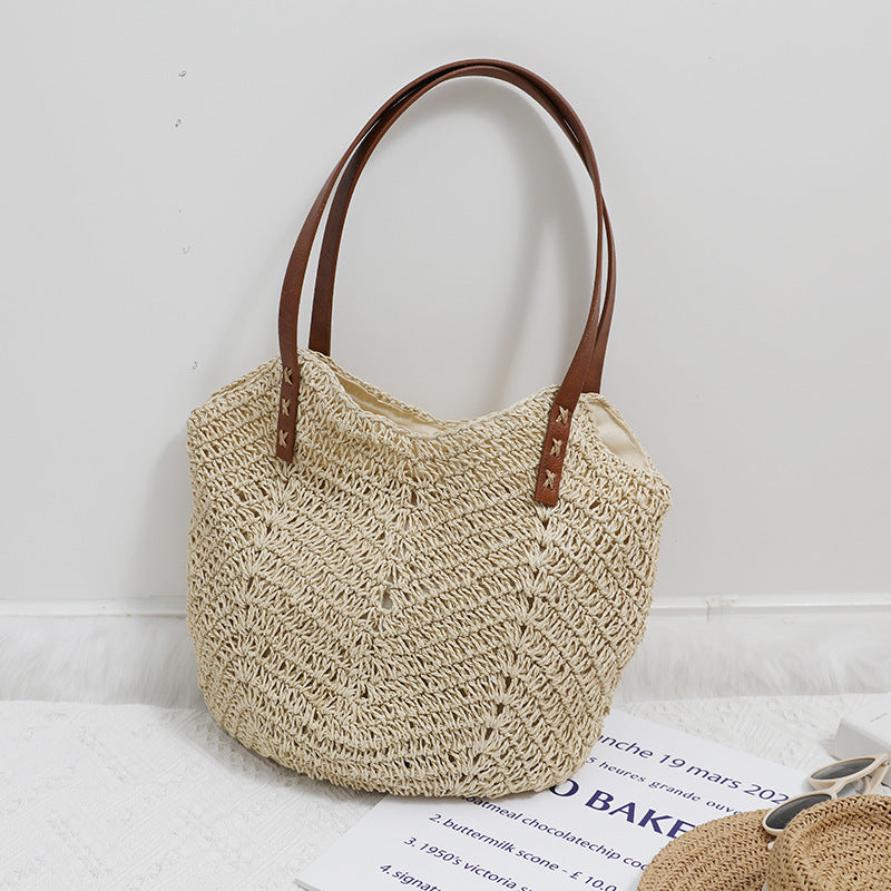 Braided basket bag with sturdy leather handles Stornfield