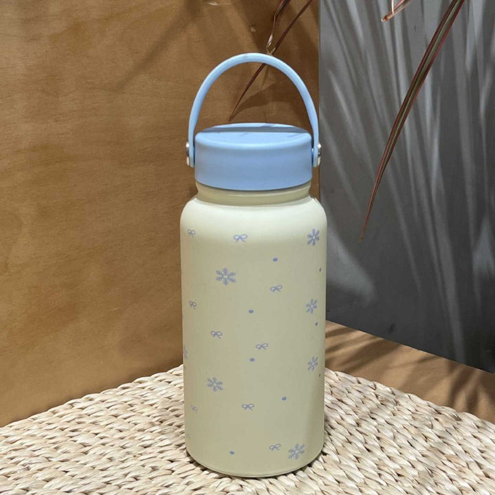 Women's insulated drinking bottle with practical carrying handle and cheerful design Stornfield
