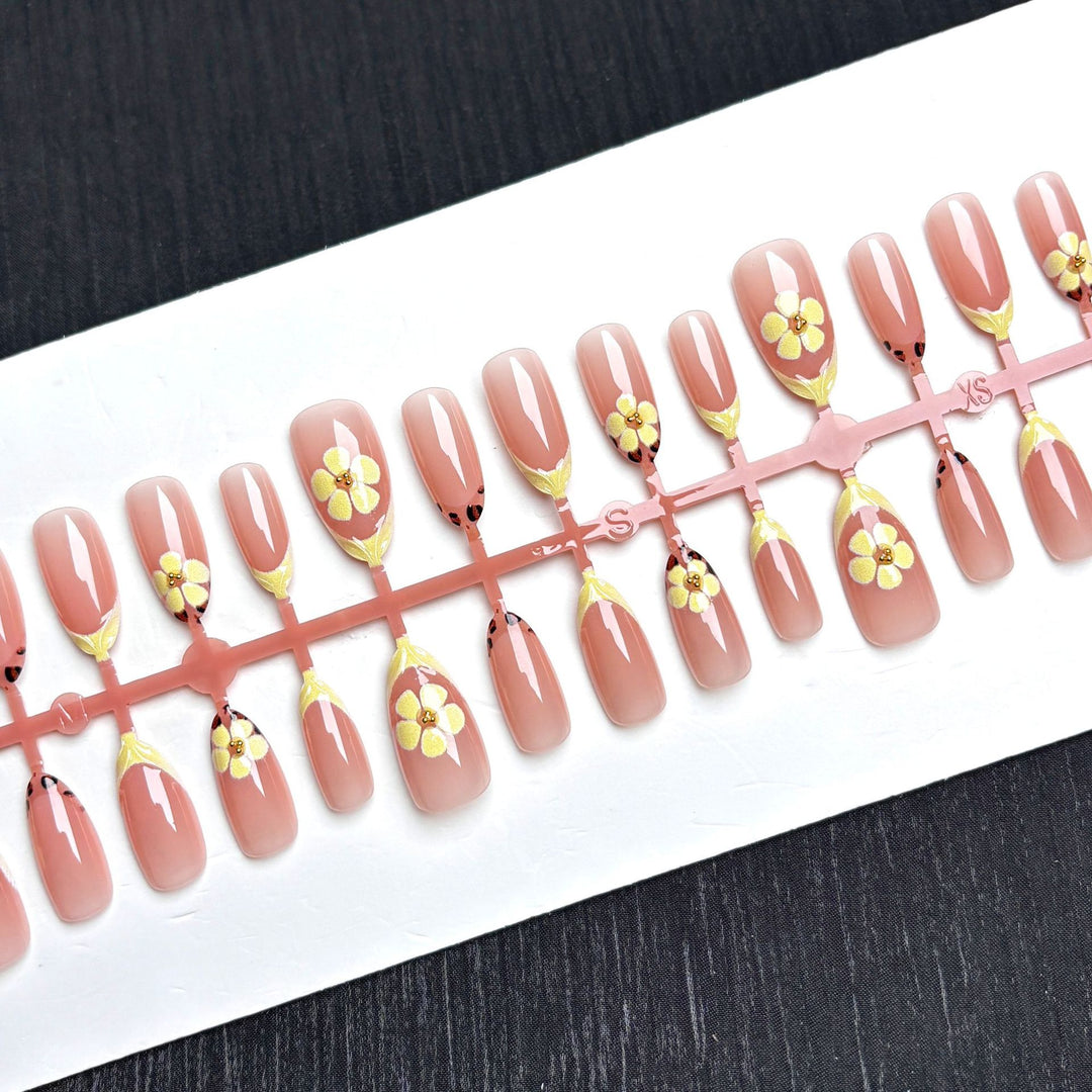 Artistic Press-On Nail Set with Floral Embellishments
