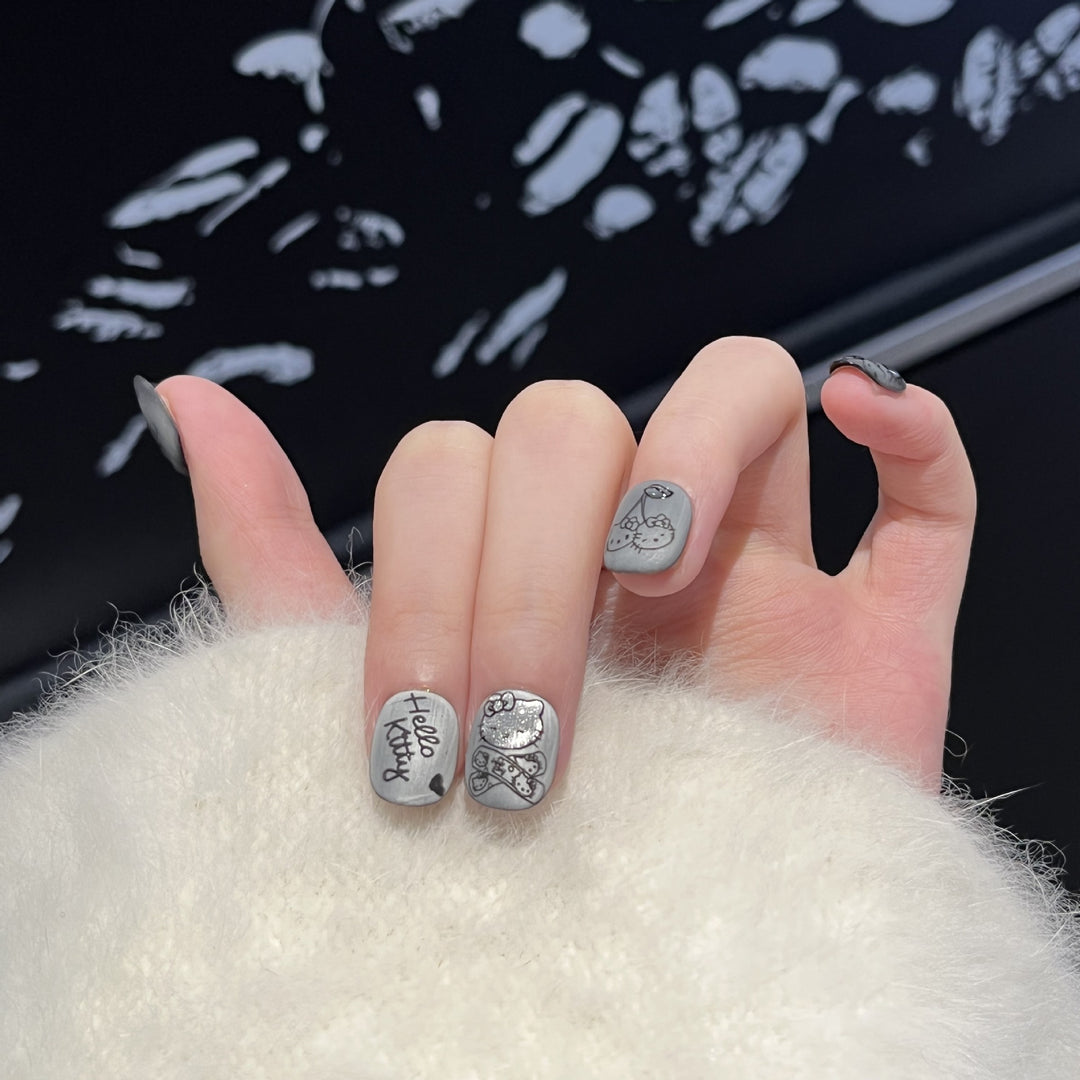 Artistic Press-On Nail Set with Whimsical Character Designs Stornfield