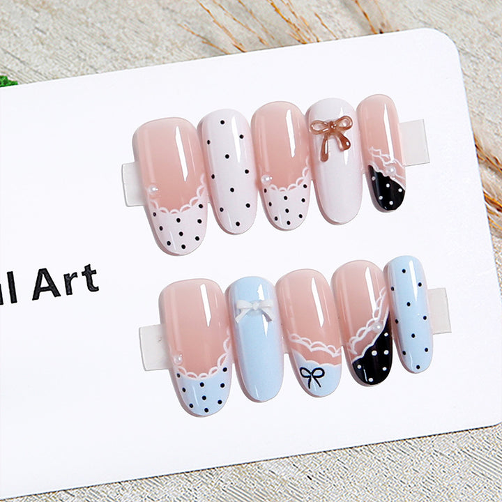 Artificial nail set with elegant accents and fine designs Stornfield