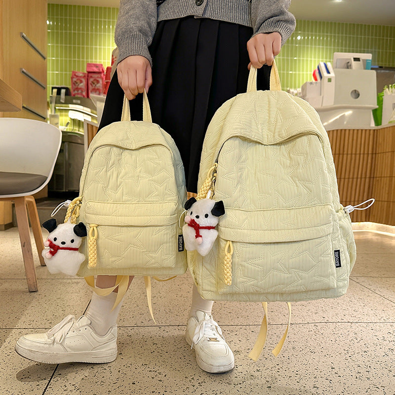 Quilted Backpack with Decorative Charm Stornfield