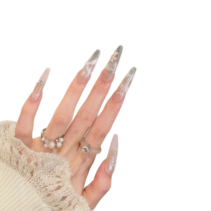 Elegant Stiletto Press-On Nail Set with Intricate Designs Stornfield