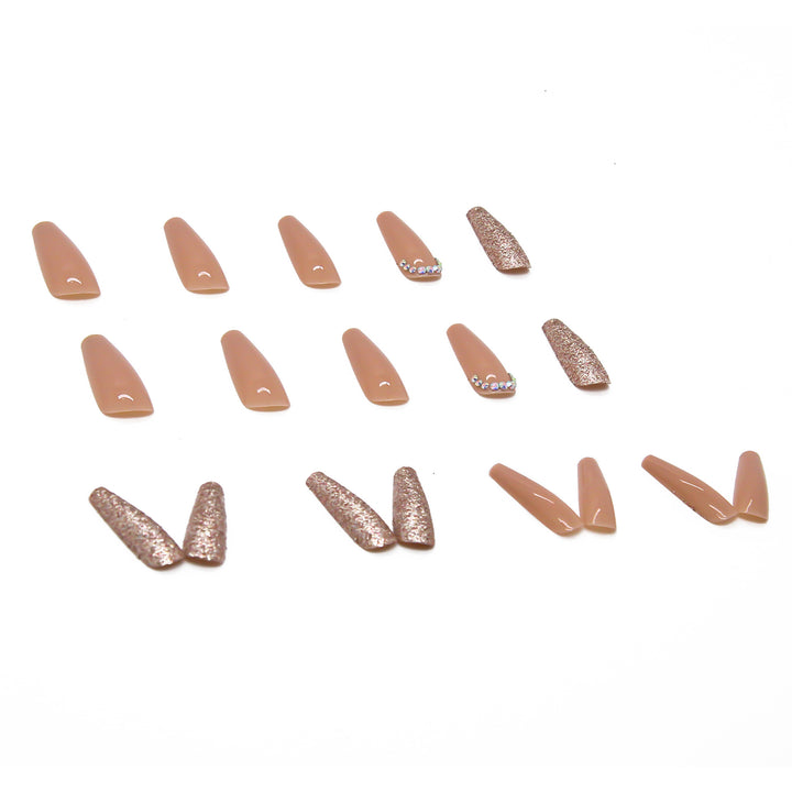 Glamorous artificial nail extensions with rhinestone and glitter details Stornfield