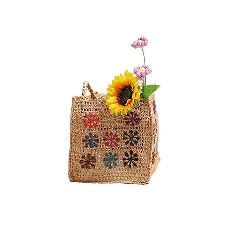 Handcrafted straw bag with colorful embroidery design Stornfield