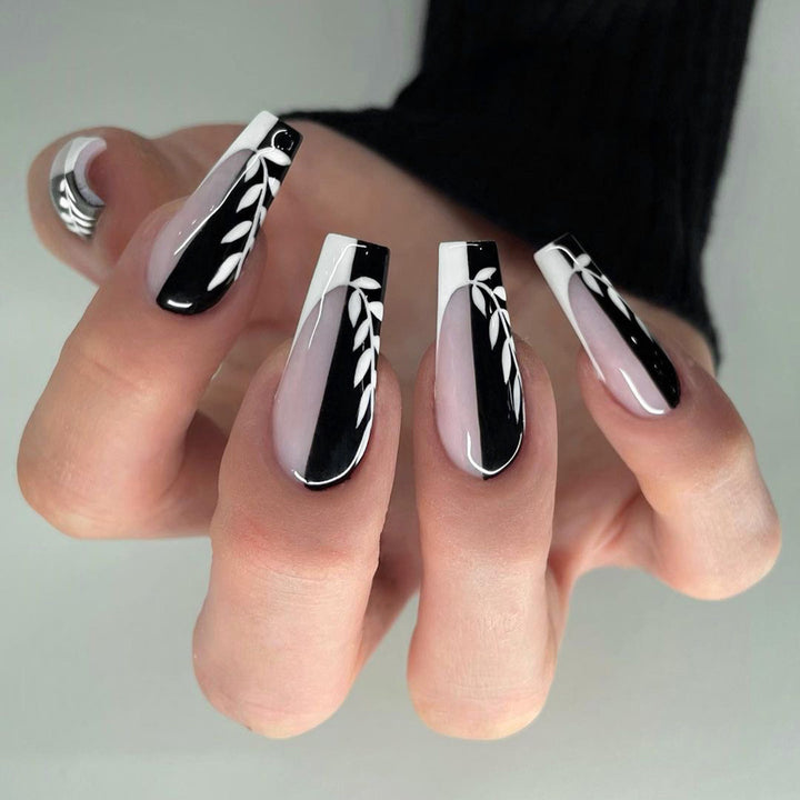 Artful nail extensions in elegant black and white design Stornfield