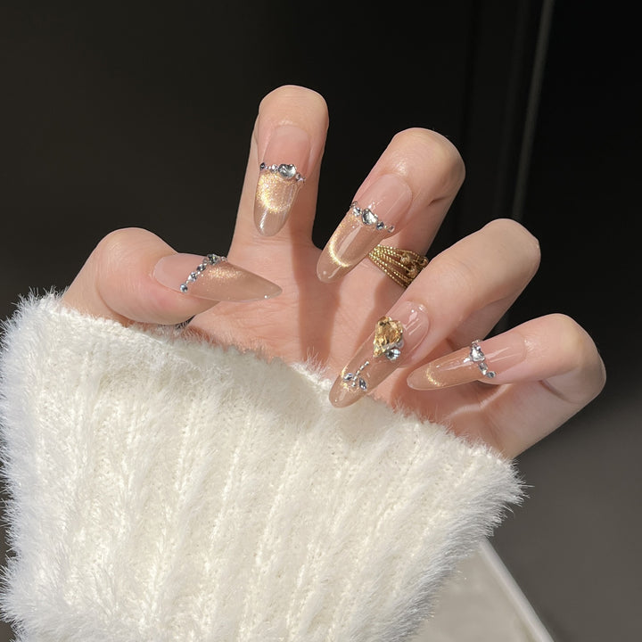 Elegant Nail Art Extensions with Pearl Accents Stornfield