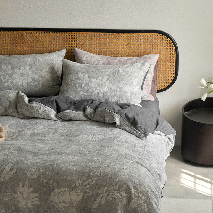 Reversible cotton bedding set with floral toile print and linen look