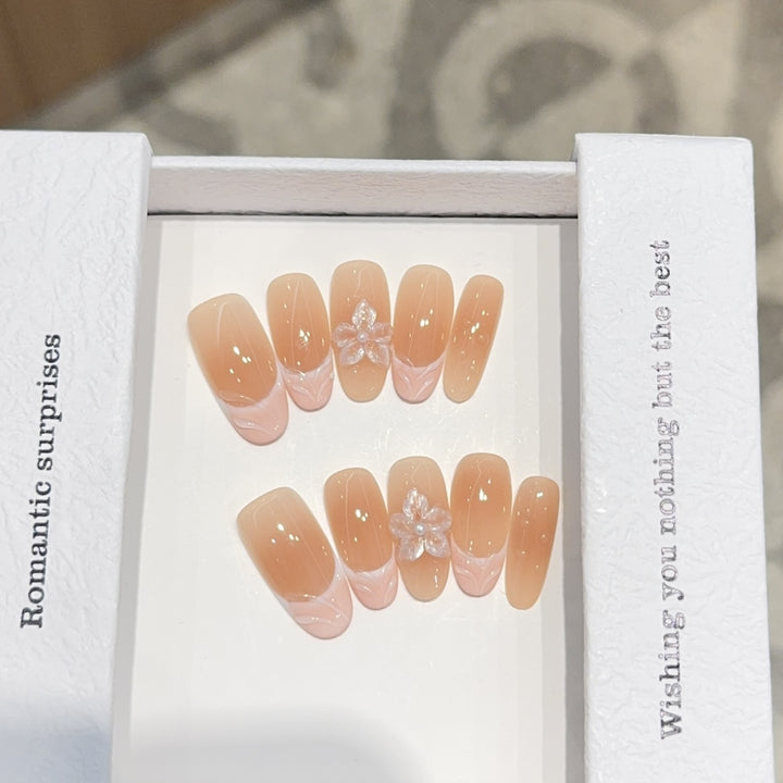 Artificial nails with romantic 3D flower accents Stornfield