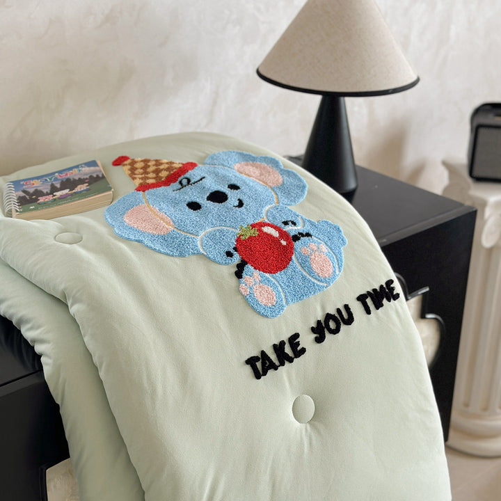 Children's bedding with tufted rabbit appliqué
