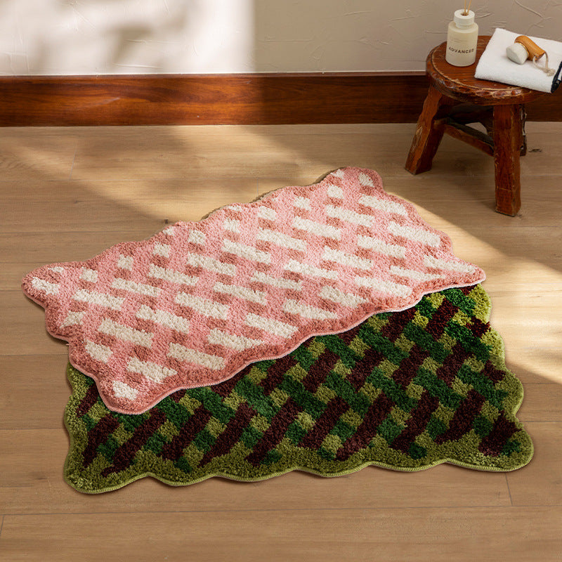 Tufted bathroom runner with wavy hem and relief-style braided pattern Stornfield