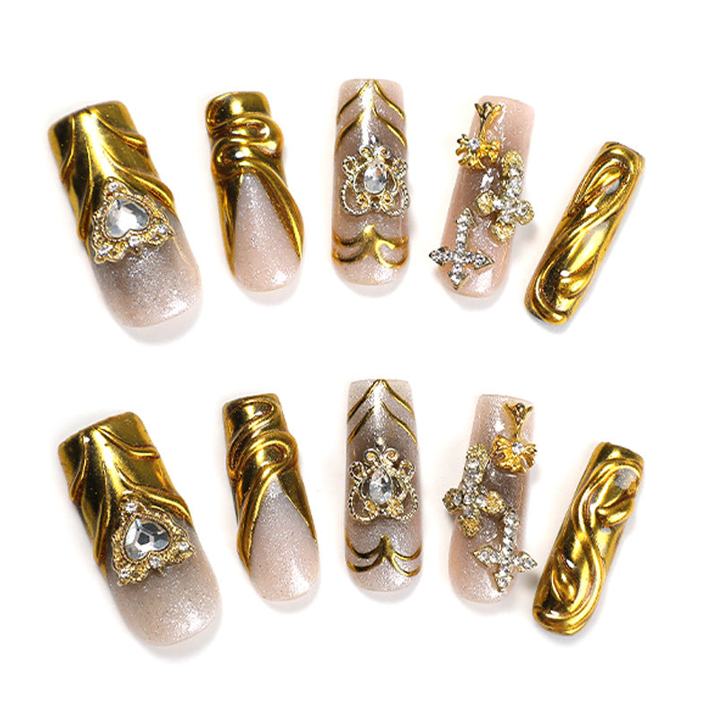 Artificial nail set with luxurious gold embellishments Stornfield