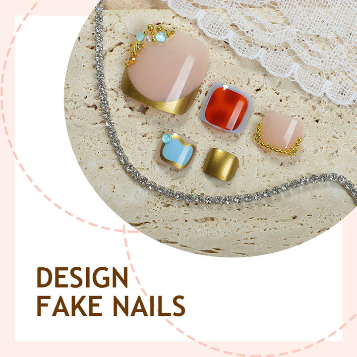Acrylic nail set with luxurious glitter and flower adornments Stornfield