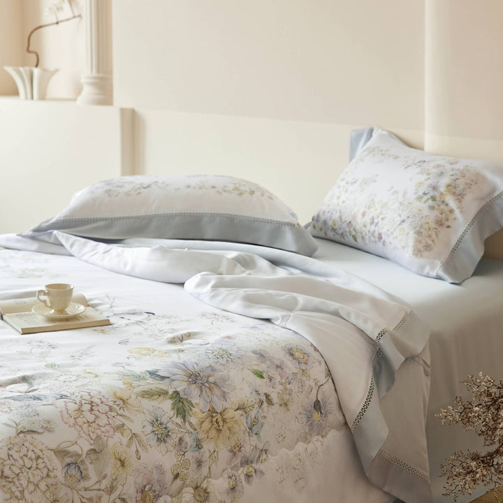 Elegant satin bedding set with floral watercolor print and ruffled bed skirt