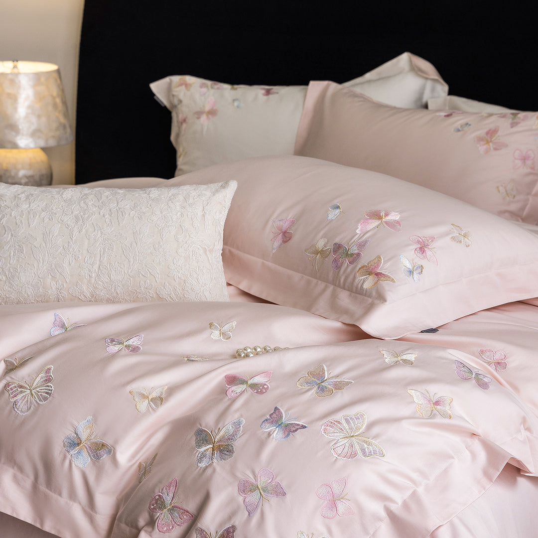 Premium bedding set made of extra soft cotton satin with delicate butterfly embroidery and concealed hotel closure