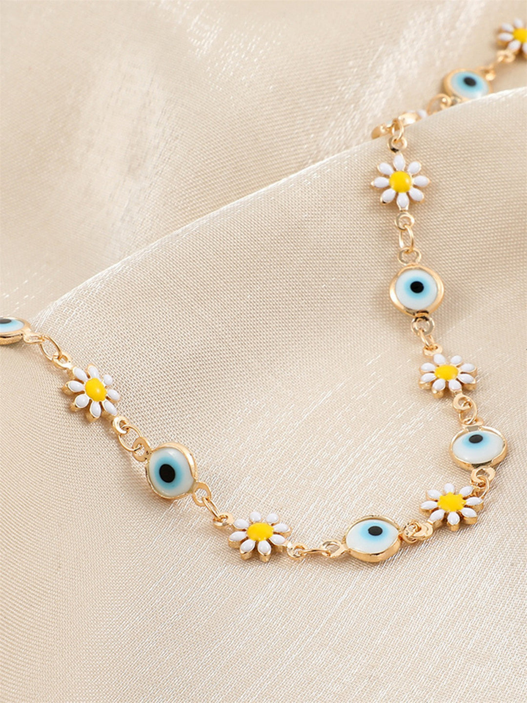 Flower and Eye Charm Bracelet Stornfield