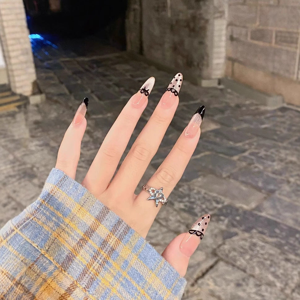 Artistic Press-On Nail Set with Unique Bow and Polka Dot Designs Stornfield