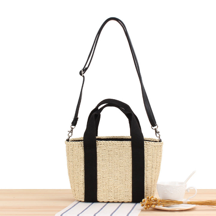 Handbag made of braided natural material with adjustable shoulder strap Stornfield