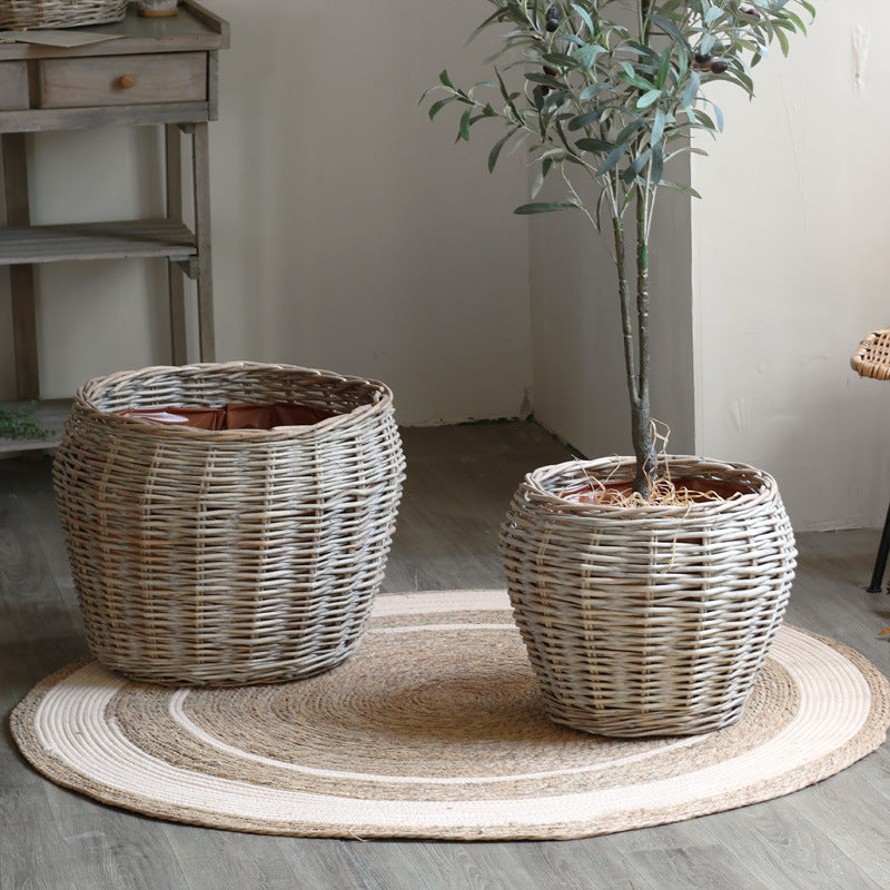 Stylish laundry basket made of braided natural material Stornfield