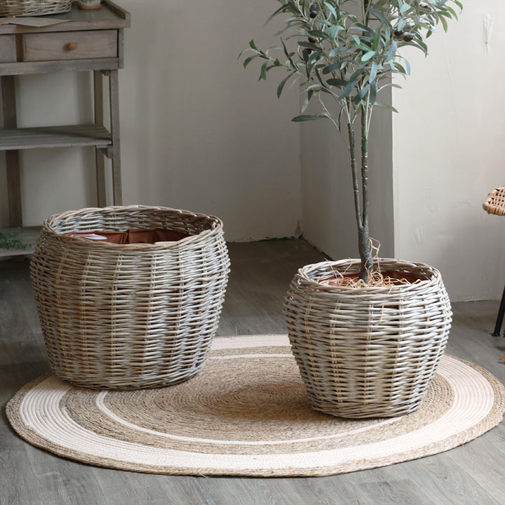 Stylish laundry basket made of braided natural material Stornfield