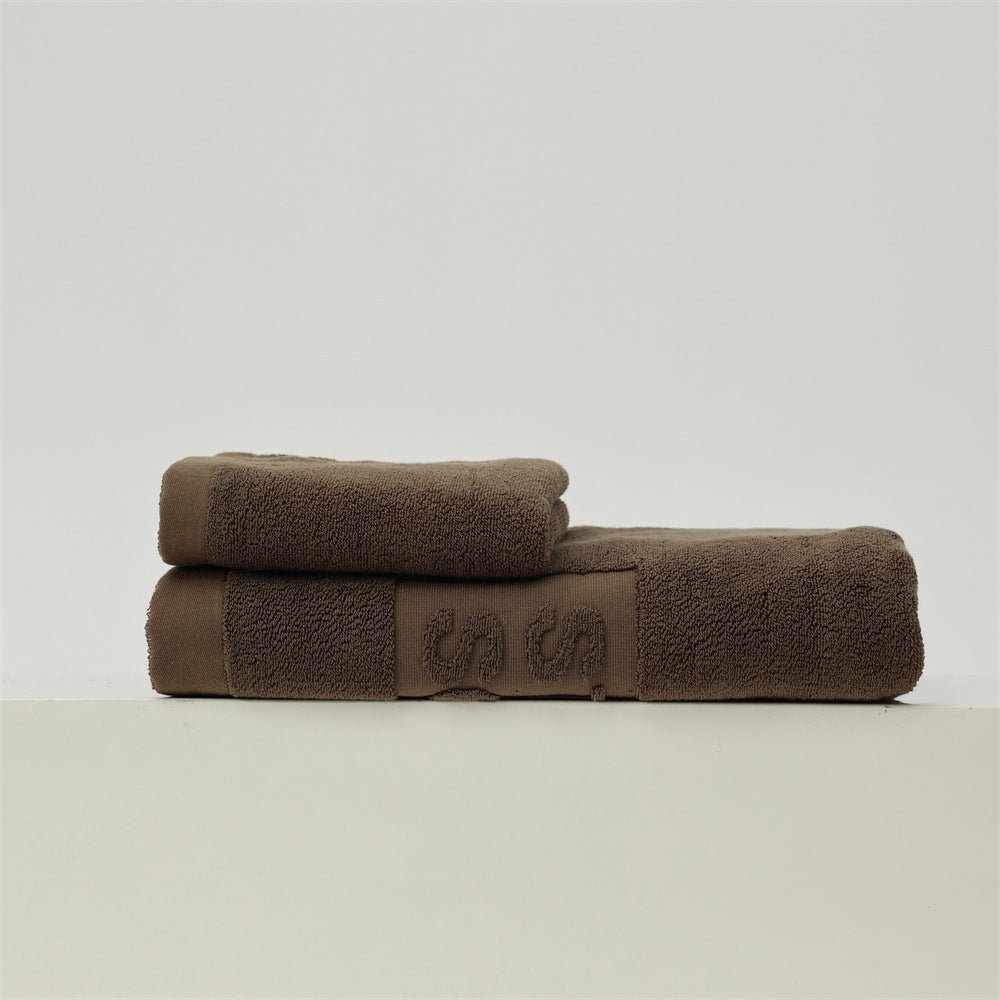 Luxury cotton terry towel set with logo border and extra soft Turquetto structure